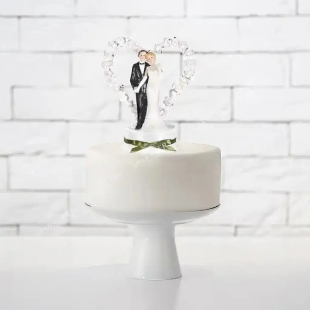 Figurine mariage couple sur coeur blanc