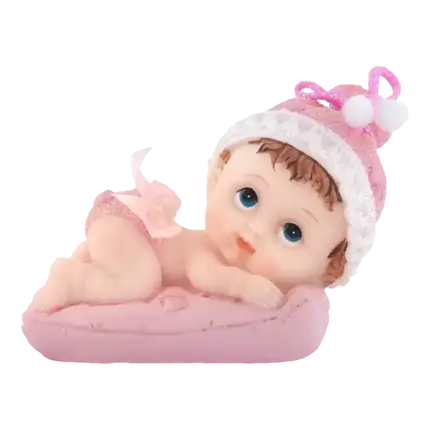 Figurine Bébé Fille sur un coussin rose