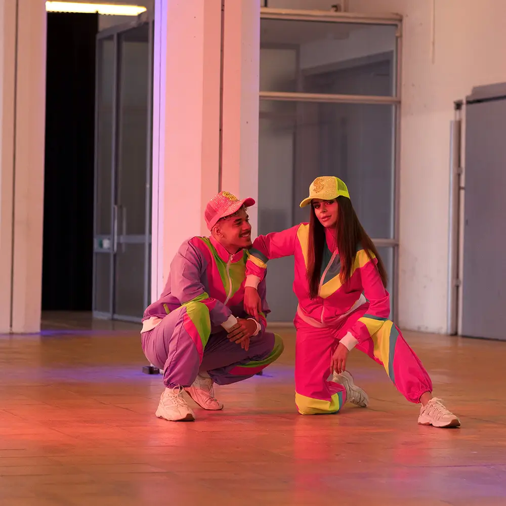 Déguisement Survêtement Rétro Femme Rose Fluo UV Taille M – Années 80